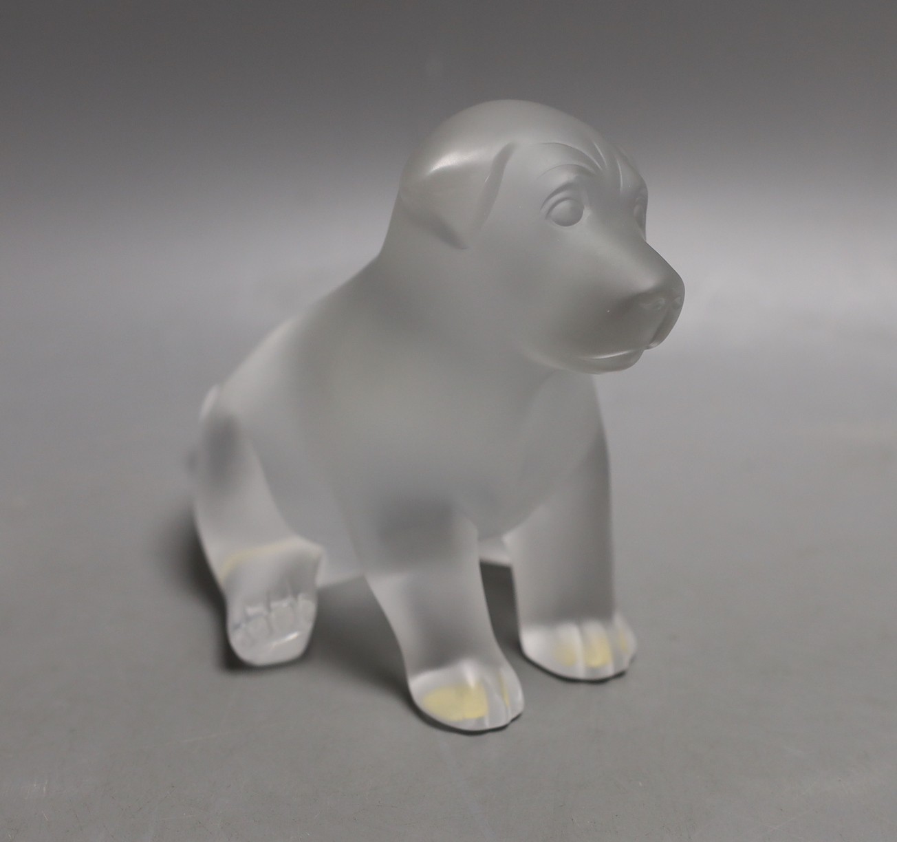 A Lalique dog, base etched ‘Lalique R France’, 13cm